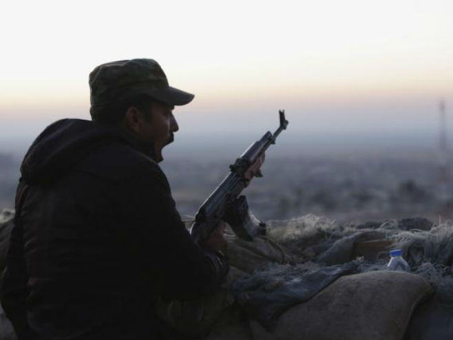 Курдски борац у Ираку - Фото: AP