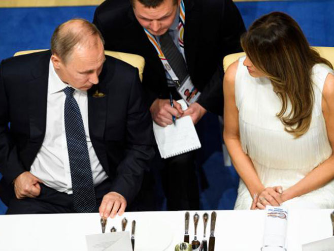 Владимир Путин и Меланија Трамп - Фото: getty